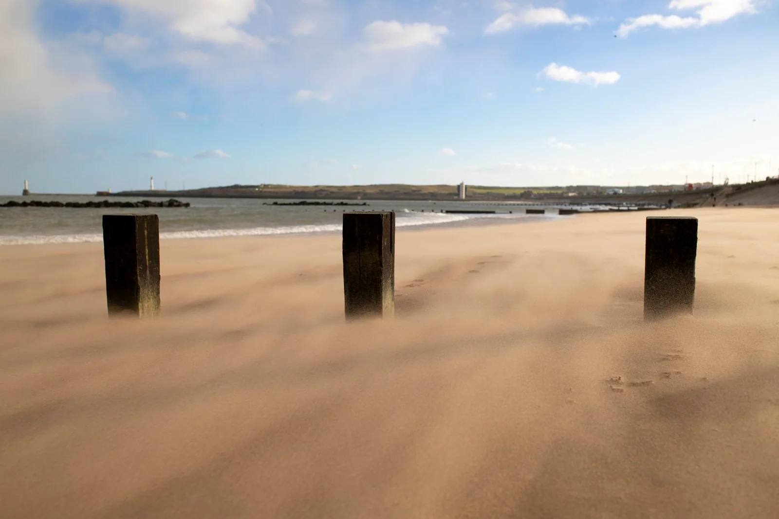 Three posts on Aberdeen beach
